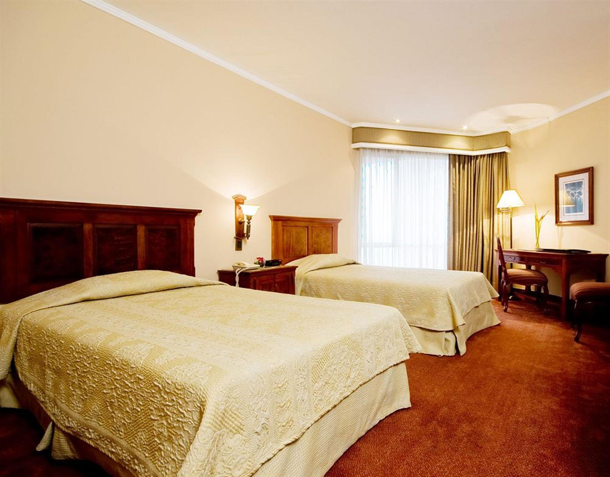 Hotel Dann Carlton Belfort Medellin Exterior photo A room at the hotel